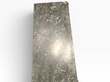 a close up of a marble block on a white surface