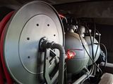an image of a train engine with a lot of hoses