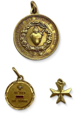 two gold medals and a cross on a white background