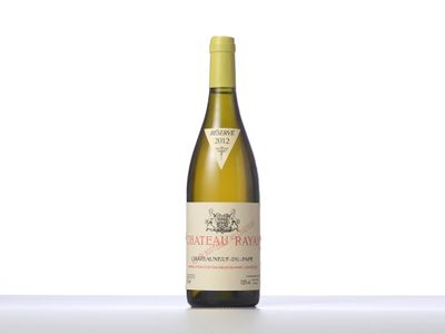 a close up of a bottle of wine on a table
