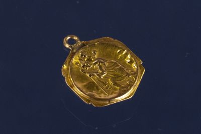 une image représentant une pièce d'or sur laquelle figure un homme