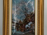 tableau encadré représentant une charrette tirée par des chevaux avec un homme à bord