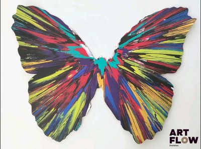 painting of a colorful butterfly on a white background with the words art flow