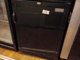 a black and silver refrigerator and a black and silver oven