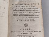 an open book with a black and white title on it