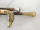 two old canes that are on a table