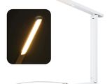 an image of a white desk lamp with a remote control
