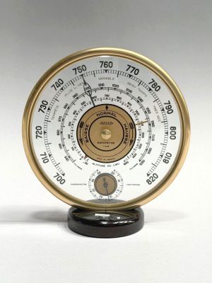 a clock that is sitting on top of a table