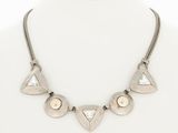 a close up of a necklace on a mannequin mannequin mannequin mannequin mannequin mannequin mannequin mannequin