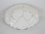 a white plate that has a peace sign on it