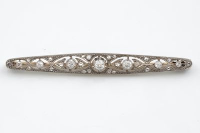 an antique diamond and pearl hair clip