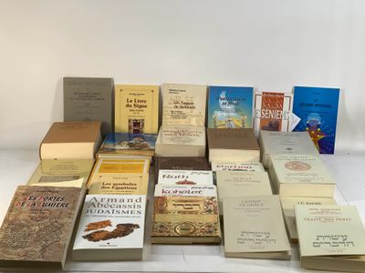 a lot of books that are sitting on a table