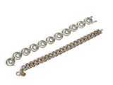 a close up of a chain with a clasp on a white background