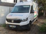 a white van that is parked in front of a house