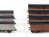 two train cars that are sitting next to each other