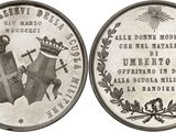 a close up of a coin with a crown on top of it