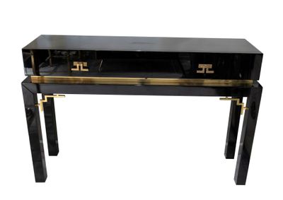 black and gold console table with glass top and brass hardware