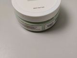 the container is sitting on the table with the lid open