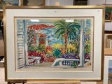 a picture of a painting on a easel in a room