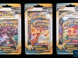 three packs of pokemon trading cards are shown in a row