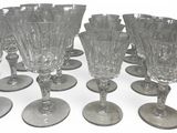 a lot of empty wine glasses on the table