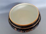 a close up of a bowl on a table