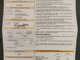 a document with a picture of a person ' s name on it