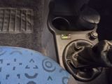 a close up view of a car ' s gear lever