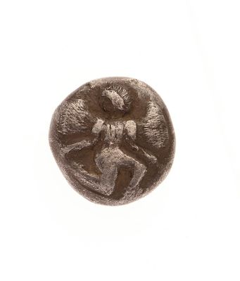 une image représentant une pièce de monnaie sur laquelle est assise une femme