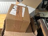boxes stacked on top of each other on a kitchen counter