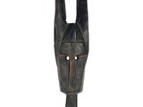 an image of a wooden sculpture of a horse ' s head on a white background
