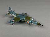 a toy airplane that is sitting on a table