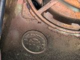 a close up of a person working on a machine