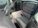 a picture of the inside of a car with the front seats down