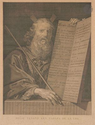 portrait of a man with a long beard holding a sheet of paper and a pen