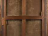 an old wooden window with a glass pane in it