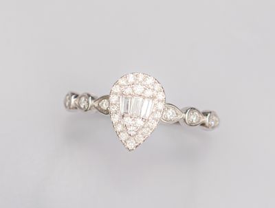 a diamond and white gold ring