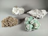 three different types of minerals are displayed on a white surface