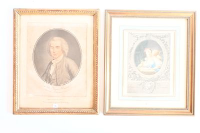 deux portraits encadrés représentant un homme et une femme, accrochés au mur