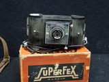a small camera sitting on top of a box