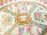 a plate with a ring on it sitting on a table