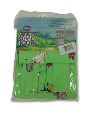 a close up of a bag of green cloth with a cartoon on it