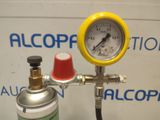 a close up of a gas can with a pressure gauge on it