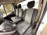a view of the inside of a van from the driver ' s seat