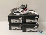 brand new adidas superstar shoes in black and white with pink accents