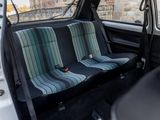 a seat in the back of a car with a seat cover on