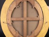 a round wooden object with a hole in the middle