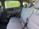 two seats in the back of a car that are empty