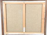 a close up of a picture frame with a piece of fabric on it