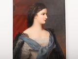 portrait of a woman in a blue dress with a shawl around her neck